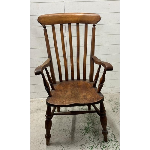 69 - A Victorian slat back Windsor chair