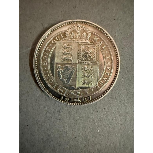 695 - An 1887 Victorian shilling in UNC condition