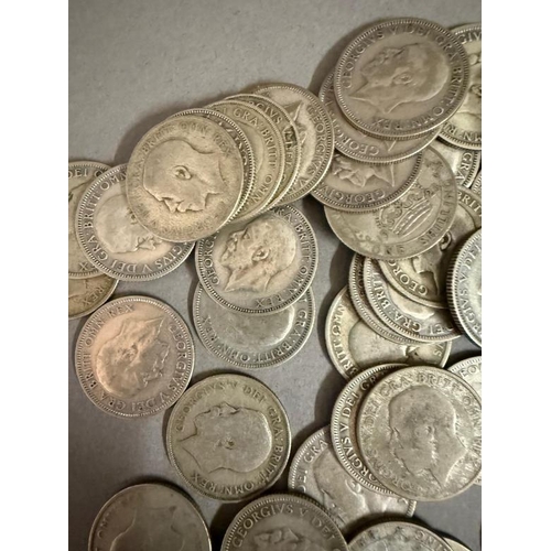 701 - Fifty Four George V shillings 1920-1936