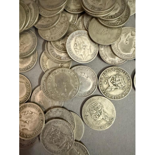 701 - Fifty Four George V shillings 1920-1936