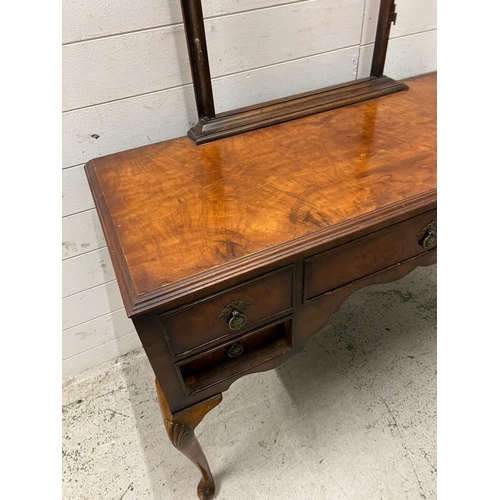 71 - A burr walnut dressing table with mirror (H76cm W112c D49cm)