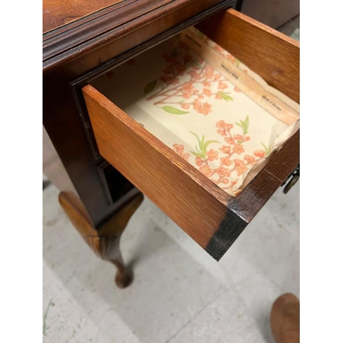 71 - A burr walnut dressing table with mirror (H76cm W112c D49cm)