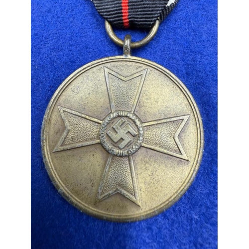 738 - A  WWII German War Merit Medal