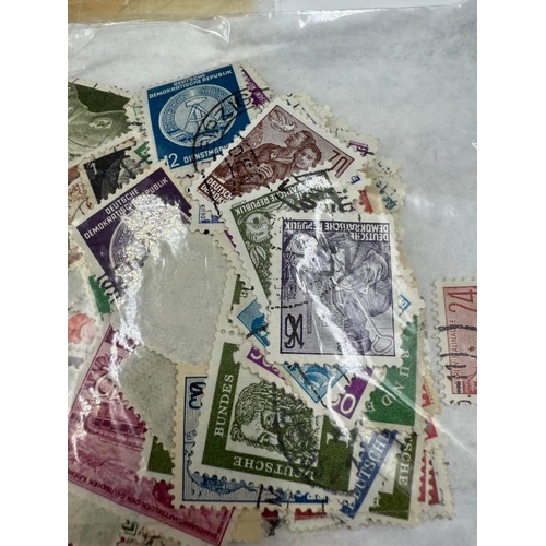 798 - A quantity of loose and some sheets of German stamps, various ages and denomination to include WWII