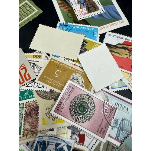 799 - A quantity of loose mostly German mint stamps, various ages and denominations