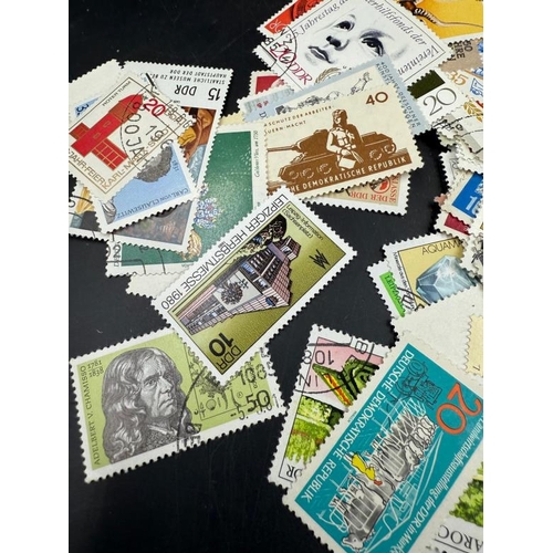 799 - A quantity of loose mostly German mint stamps, various ages and denominations