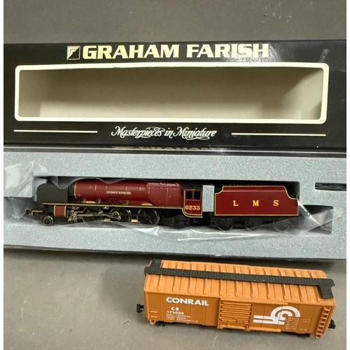 821 - A Graham Farish model railway engine, a Bachman model train and two rolling stock