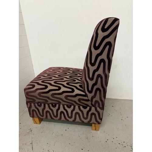 91 - A purple accent chair upholstered in harlequin Arkona Weave fabric (H95cm W60cm D72cm SH48CM)