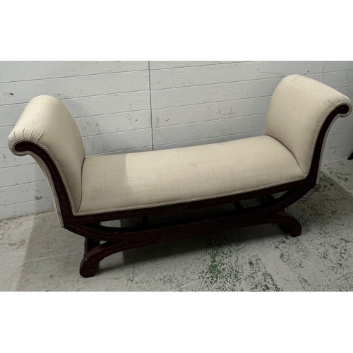 97 - Reproduction window seat with scrolling arms in a classical style on sabre legs