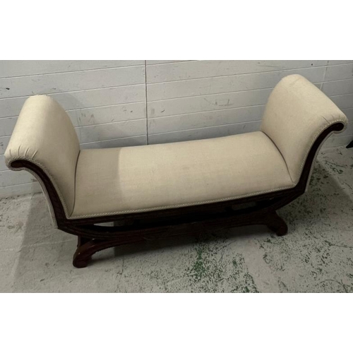 97 - Reproduction window seat with scrolling arms in a classical style on sabre legs