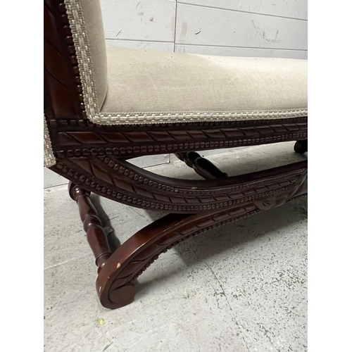 97 - Reproduction window seat with scrolling arms in a classical style on sabre legs