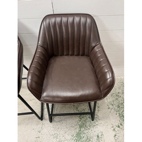 4 - A pair of bar stools with faux leather upholstery
