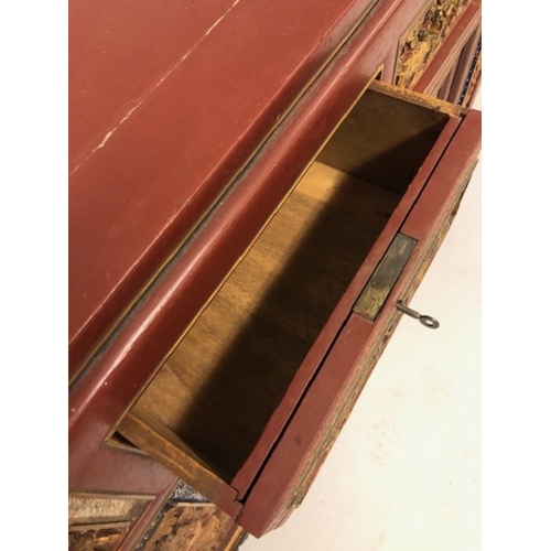42 - Chinese wedding cabinet of red and gold lacquer, the front panels and doors profusely carved in pier... 