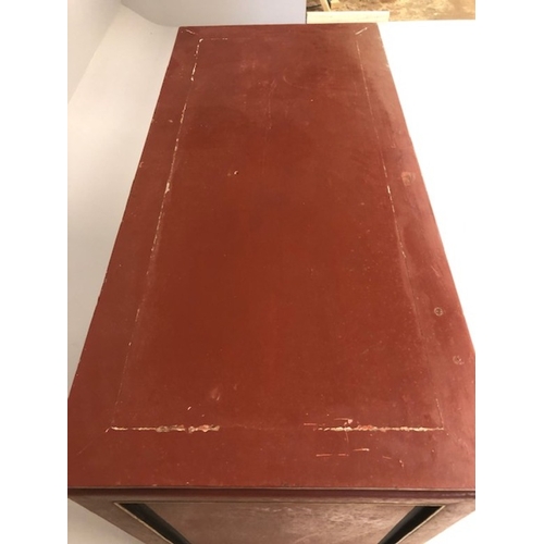 42 - Chinese wedding cabinet of red and gold lacquer, the front panels and doors profusely carved in pier... 