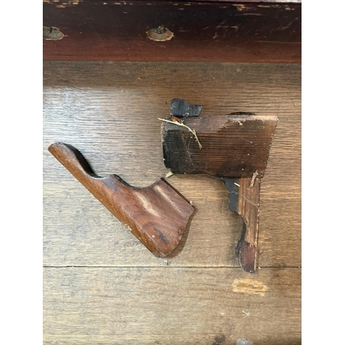 25 - A mahogany bureau comprising of two short drawers over three graduated long, the fall opening to pig... 