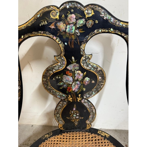28 - A Mid 19th Century black lacquer open arm chair with mother-of-pearl inlay, gilt foliate decoration ... 