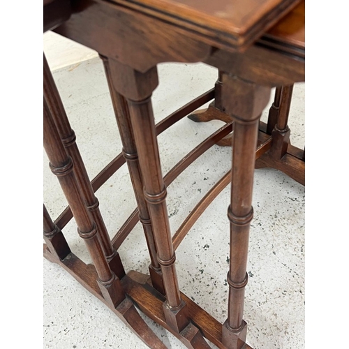 11 - A nest of three tables on turned legs (H57cm x 34cm x 50cm)
