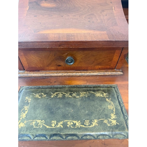 122 - An Edwardian style mahogany writing table with tooled green leather writing surface H98cm W106cm D54... 
