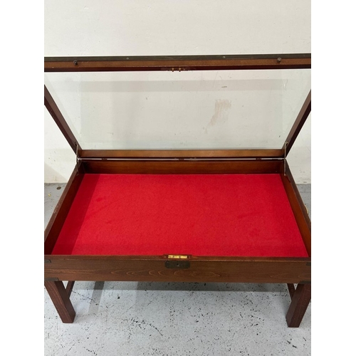 13 - Miliary campaign style coffee table with glass top and brass corner fittings H49cm W100cm D59cm