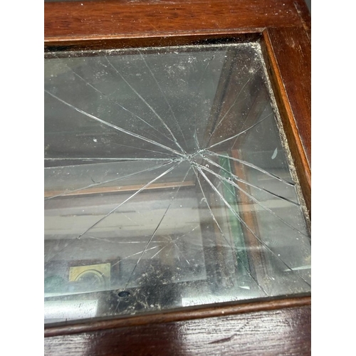 133 - A mahogany-glazed table top display cabinet with two drawers under
