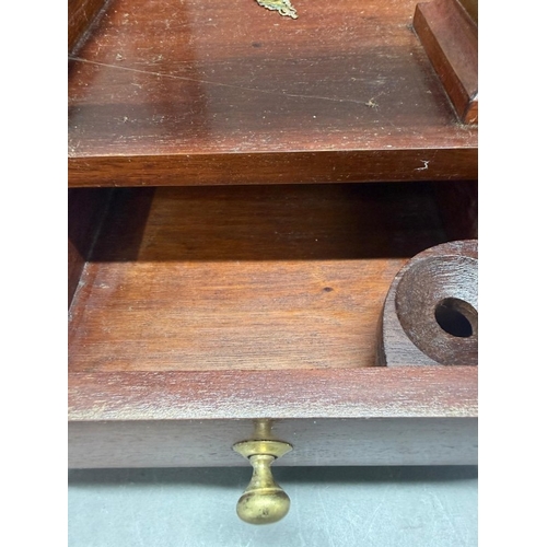 133 - A mahogany-glazed table top display cabinet with two drawers under