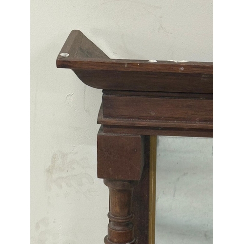 134 - An Eastlake style wall mirror with turned columns and shelf under H77cm W55cm D14cm