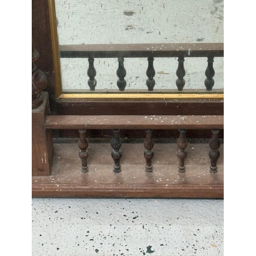 134 - An Eastlake style wall mirror with turned columns and shelf under H77cm W55cm D14cm
