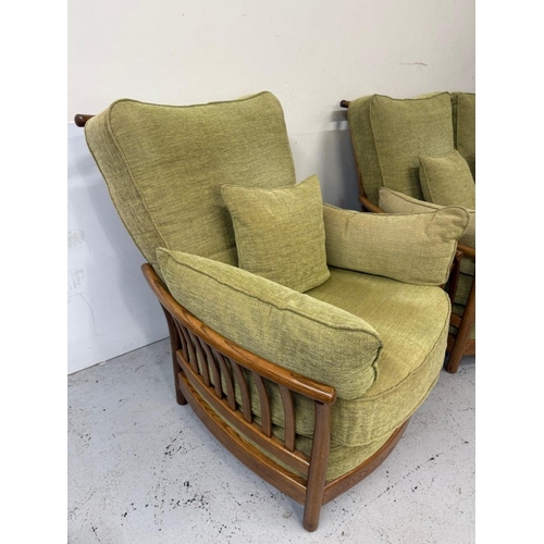 137 - An Ercol three-piece suite upholstered in green