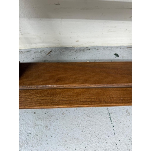 143 - An Ercol two tier wall hanging plate rack 87cm x 51cm