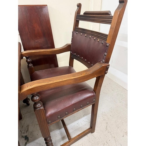 150 - A mahogany extendable dining table on turned legs and a set of six oak framed dining chairs with red... 