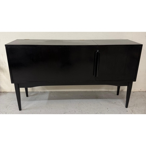 163 - A Mid Century ebonised record cabinet with hinged lid opening to storage and a single door cupboard ... 