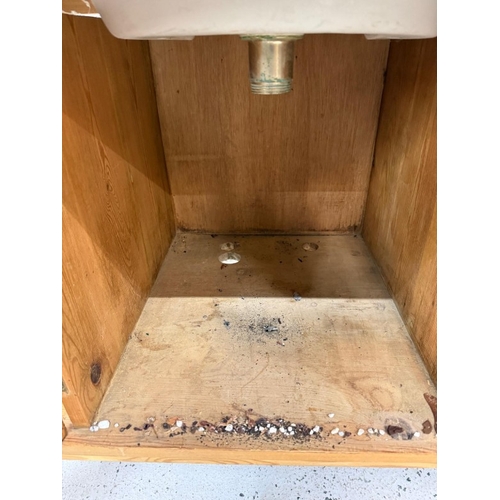 166 - A vintage pine wash stand with floral tiled back splash and sink with drawer and cupboard under H106... 