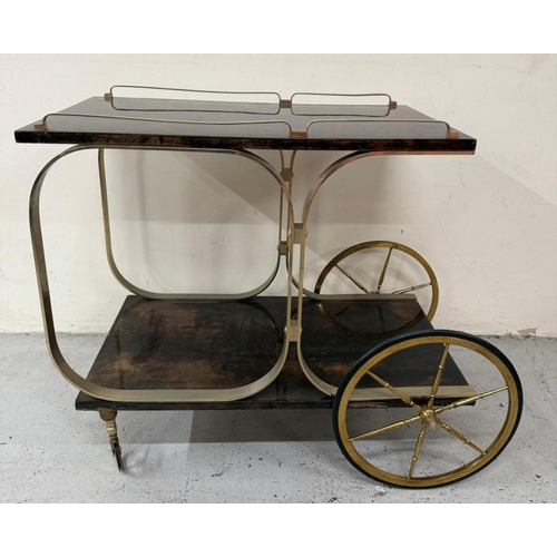 168 - An Aldo Tura Goatskin brass loop bar trolly on cart wheel effect castors and wheels H80cm W78cm D47c... 