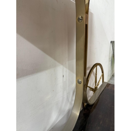 168 - An Aldo Tura Goatskin brass loop bar trolly on cart wheel effect castors and wheels H80cm W78cm D47c... 