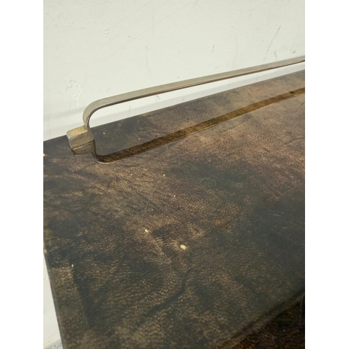 168 - An Aldo Tura Goatskin brass loop bar trolly on cart wheel effect castors and wheels H80cm W78cm D47c... 
