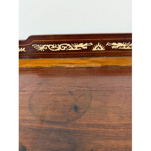 173 - A Chinese sideboard or server with bone inlay, comprising of three short drawers over two door cupbo... 