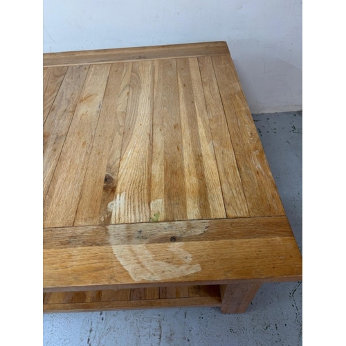 174 - A light oak square coffee table shelf under H150cm SQ100cm