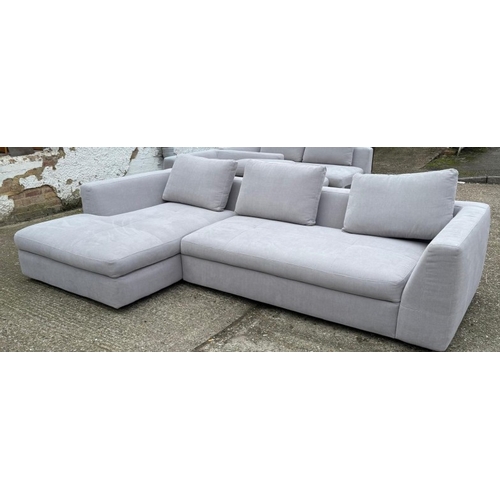 175 - An L shaped Bo Concept sofa upholstered in a light grey H60cm W259cm D170cm