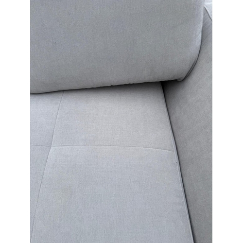 175 - An L shaped Bo Concept sofa upholstered in a light grey H60cm W259cm D170cm
