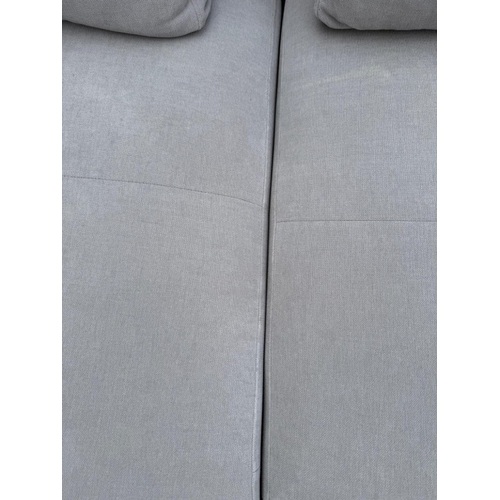 175 - An L shaped Bo Concept sofa upholstered in a light grey H60cm W259cm D170cm