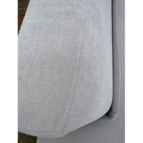 175 - An L shaped Bo Concept sofa upholstered in a light grey H60cm W259cm D170cm