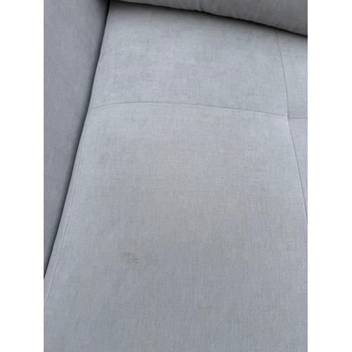 175 - An L shaped Bo Concept sofa upholstered in a light grey H60cm W259cm D170cm