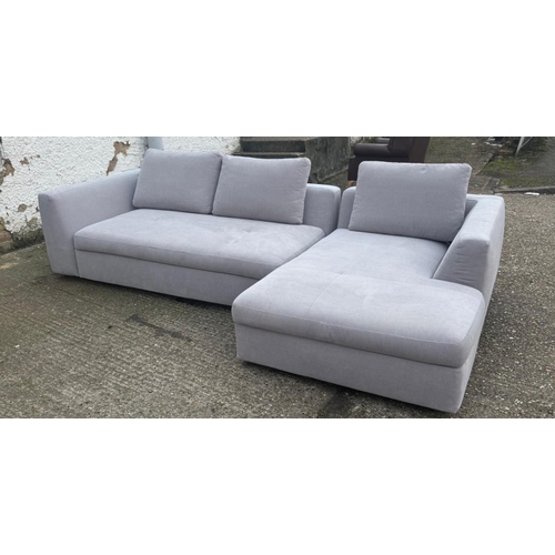 176 - An L shaped Bo Concept sofa upholstered in a light grey H60cm W259cm D170cm