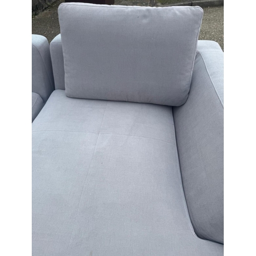 176 - An L shaped Bo Concept sofa upholstered in a light grey H60cm W259cm D170cm