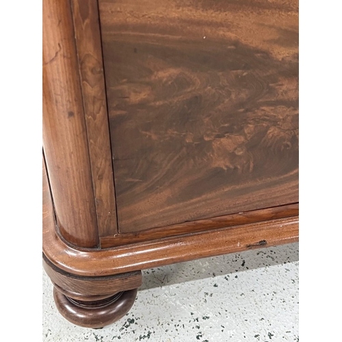 38 - Victorian flame mahogany chest of drawers on turned legs H115cm W110cm D59cm