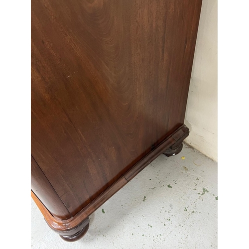 38 - Victorian flame mahogany chest of drawers on turned legs H115cm W110cm D59cm