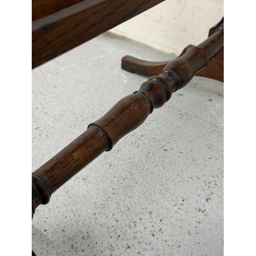 48 - A Regency style oak fire screen with a glazed panel embroidered with a naval scene and a folding top... 