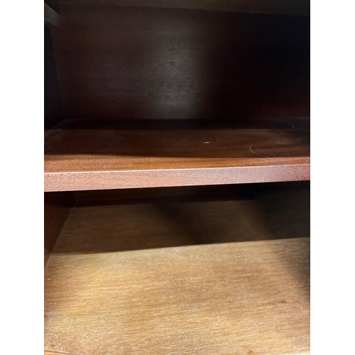 56 - A Regency style serpentine fronted veneered sideboard on fluted legs H92cm W160cm D47cm