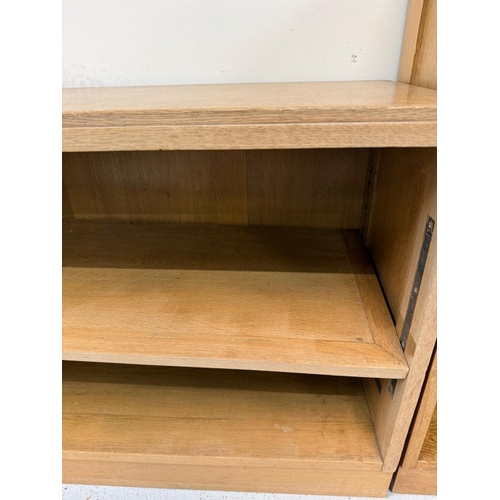 60 - A Mid Century oak modular unit comprising of three cabinets two with cupboards H77cm W100cm D30cm an... 