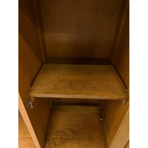 60 - A Mid Century oak modular unit comprising of three cabinets two with cupboards H77cm W100cm D30cm an... 